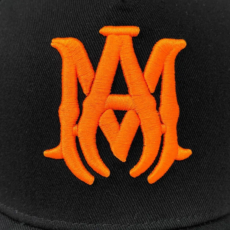 Amiri Luxus Designer Baseball Kappe Schwarz-Orange – Exklusiver Streetwear-Stil für Kenner