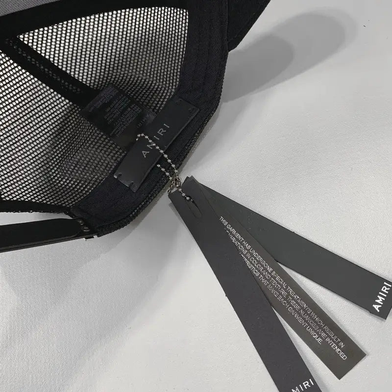 Amiri Luxuriöse Rock'n'Roll Streetwear Baseballkappe Schwarz-Weiß Exklusives Design